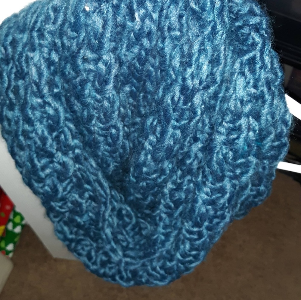Beautiful bluish green crocheted scarf